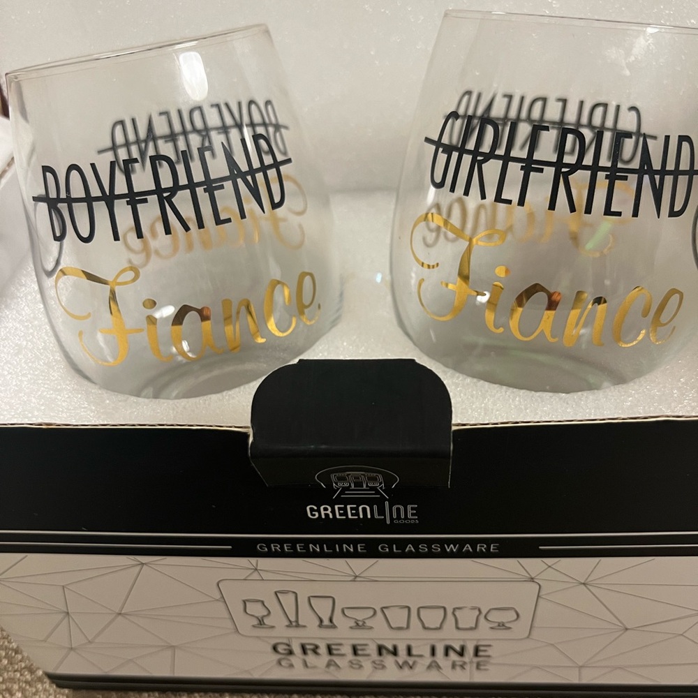 Set of Fiancé toasting glasses.